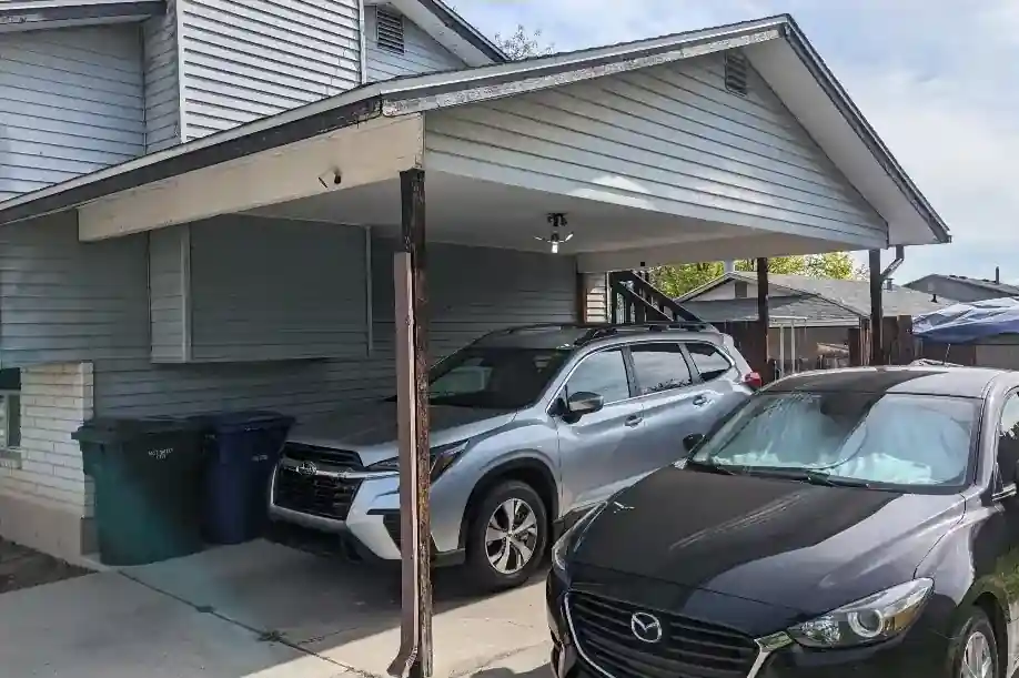 Carport before garage conversion in Millcreek Utah